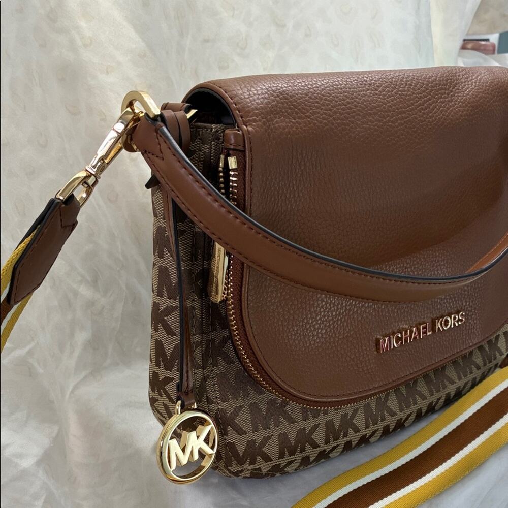 Michael Kors Brown and Tan Messenger Crossbody Bag with thick crossbody strap. - Picture 7 of 11